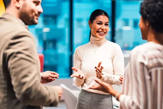 A woman celebrating her retirement with friends