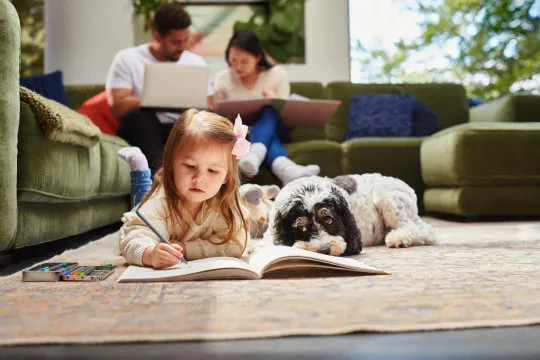 Child and parents playing in home