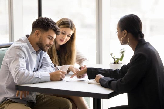 A couple working with a financial professional.