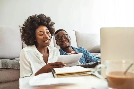 Couple reviewing financial documents