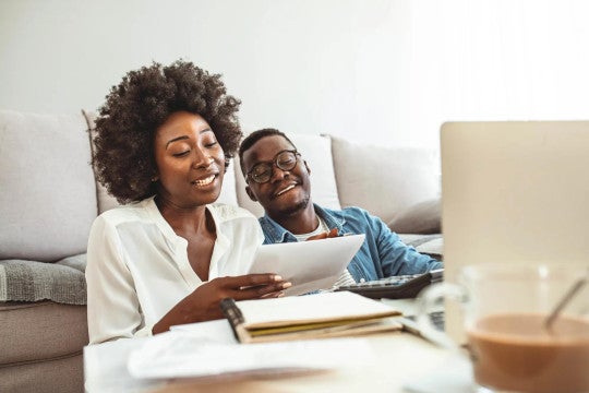 Couple reviewing financial documents