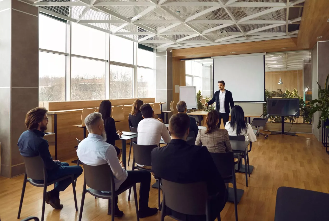 Conference room with business colleagues attending a presentation.