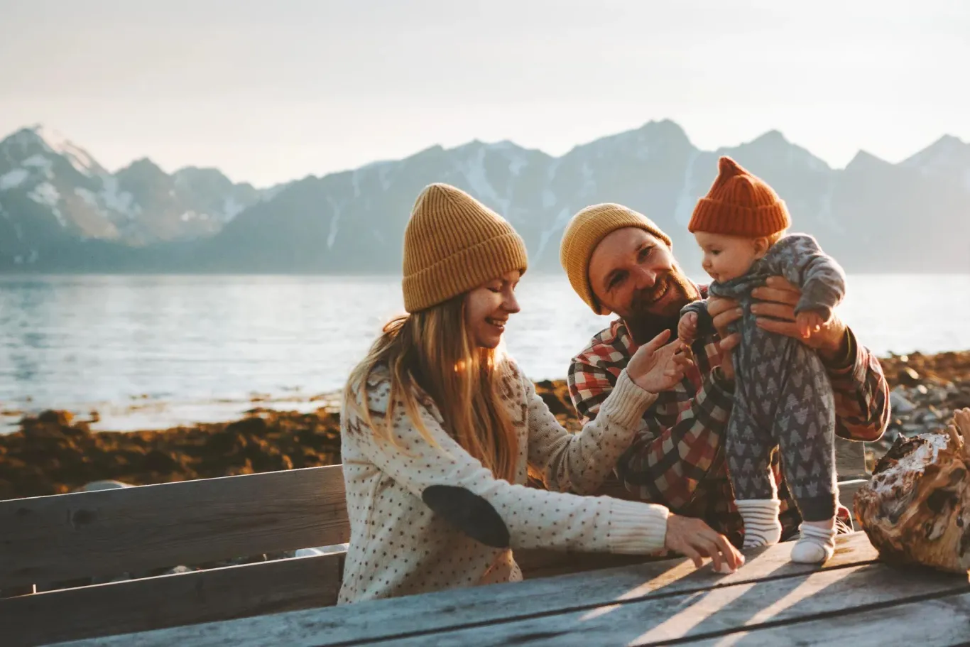 Smiling family with baby.