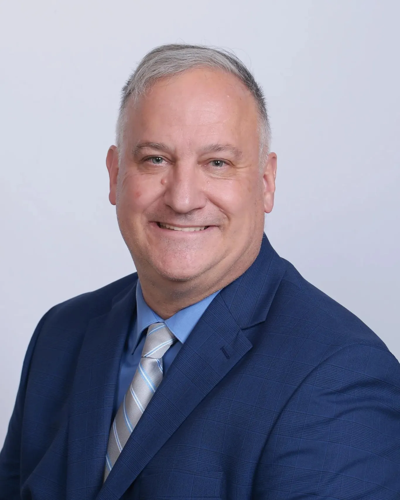 Headshot of Tom Kraupner.