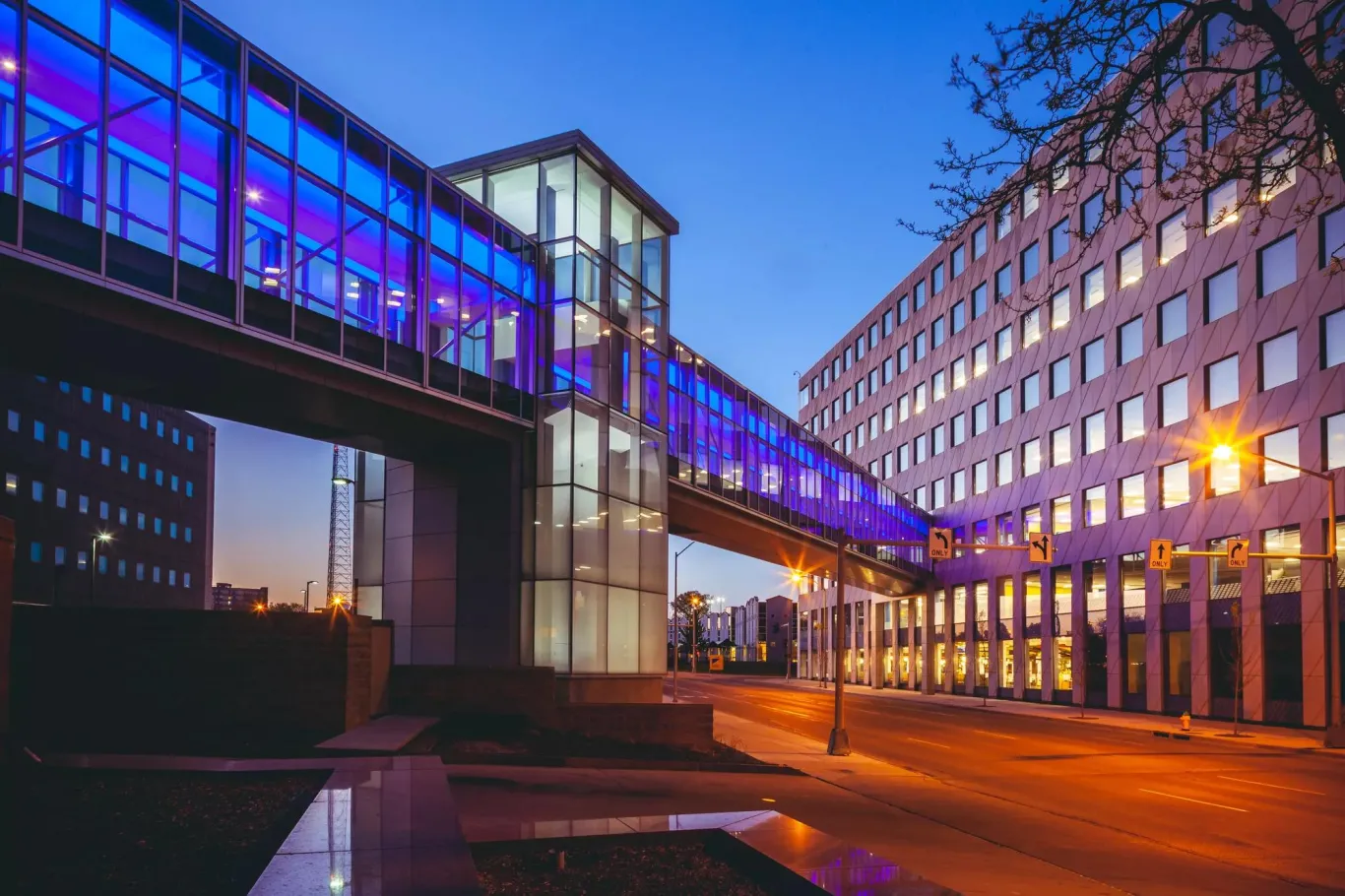 An external view of a skywalk at dusk.