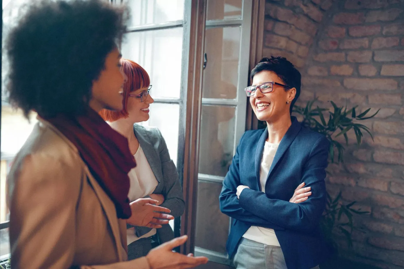 Women discussing strategy with their TPA