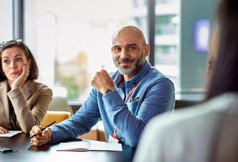 Man in meeting.