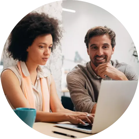 Team of colleagues brainstorming together while working in modern office.