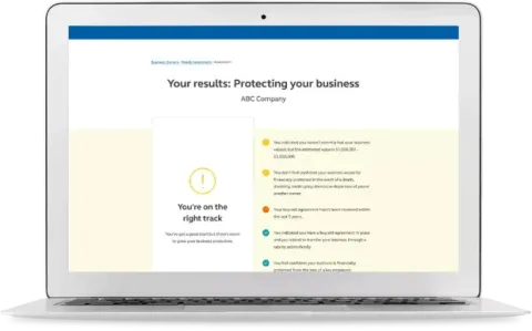 Laptop screen showing report of how a small business owner’s employee benefits compare to similarly sized organizations.