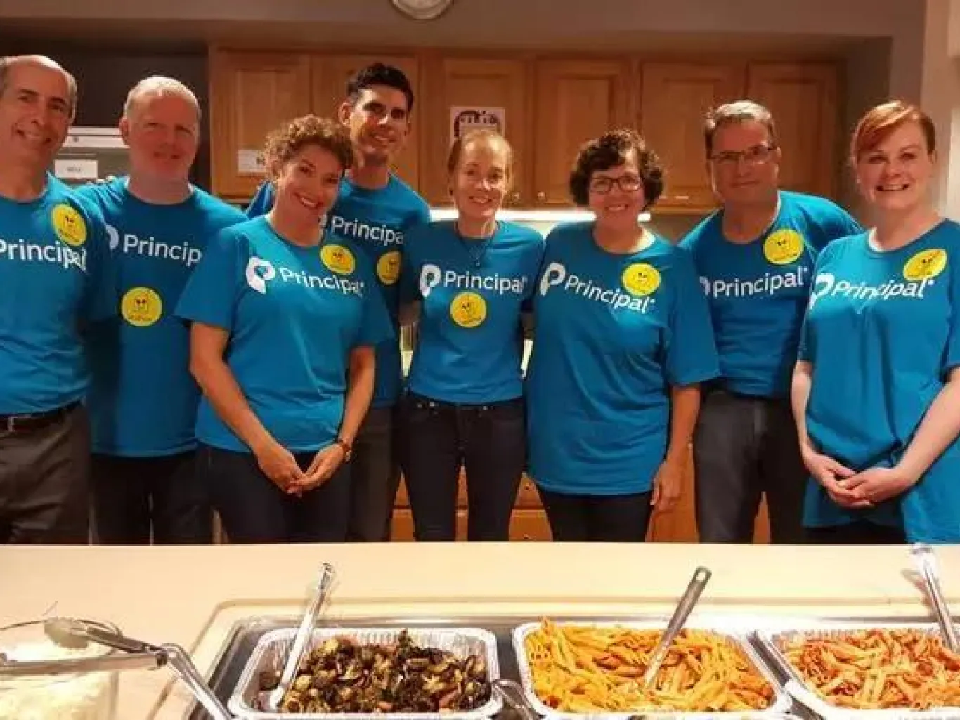 Financial professionals and Principal® staff volunteering at their local Ronal McDonald Houses.