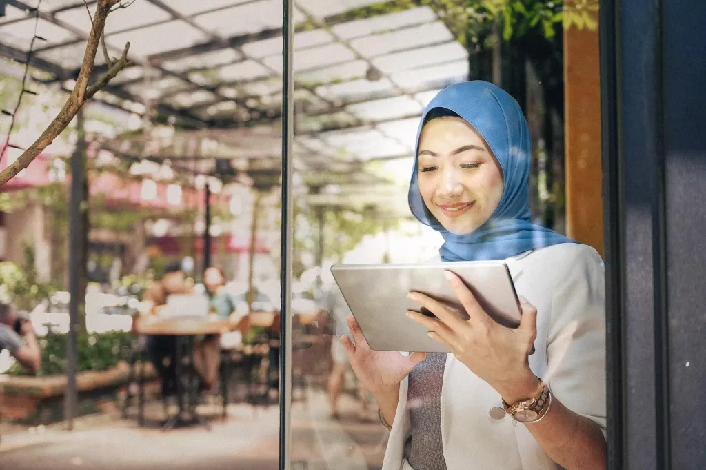 Woman working in a naturally lighted office.