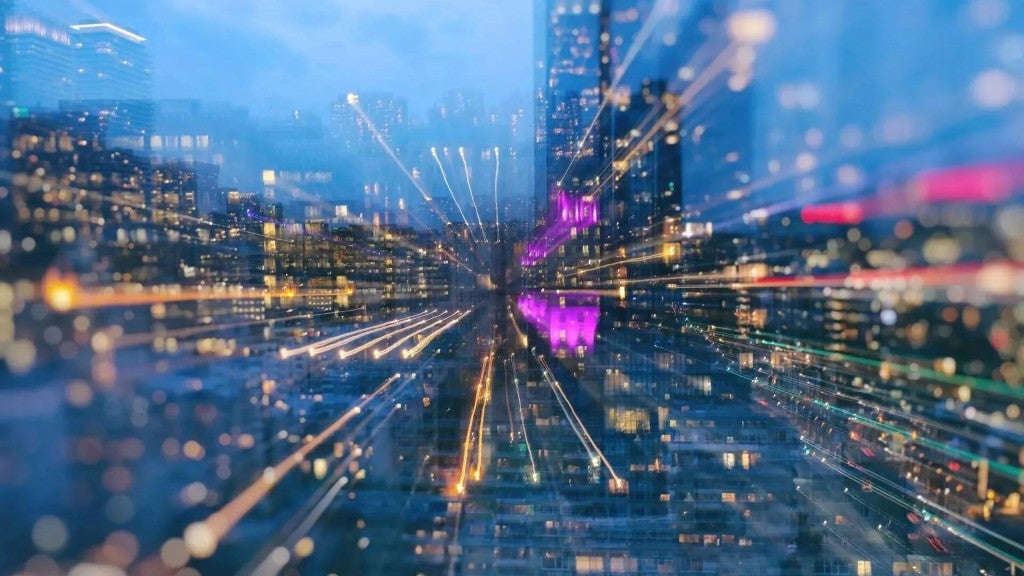 Graphic overlay of vibrant wires on top of a far-away view of skyscrapers. Graphic overlay of vibrant wires on top of a far-away view of skyscrapers.