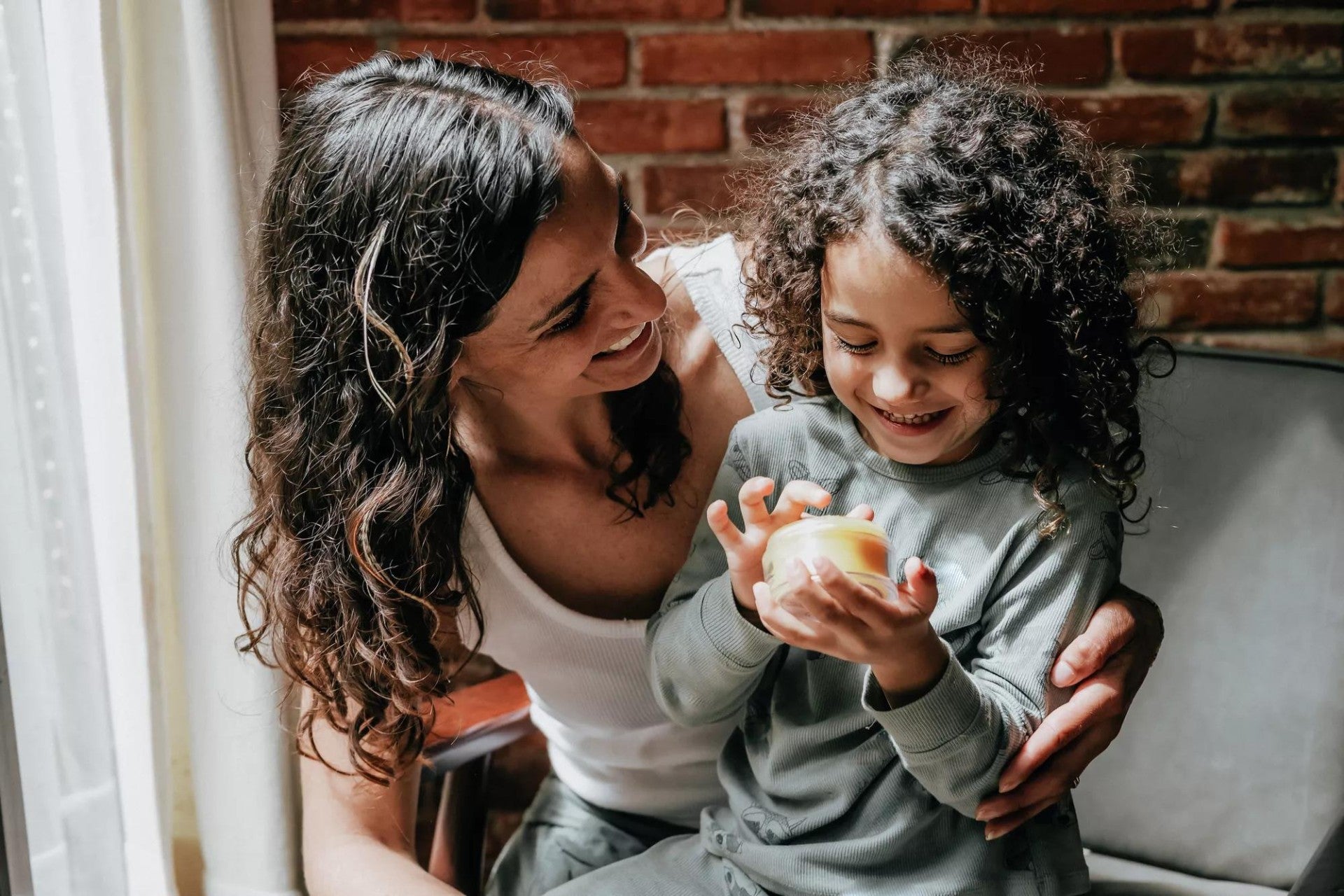 Woman with her young daughter. Woman with her young daughter.
