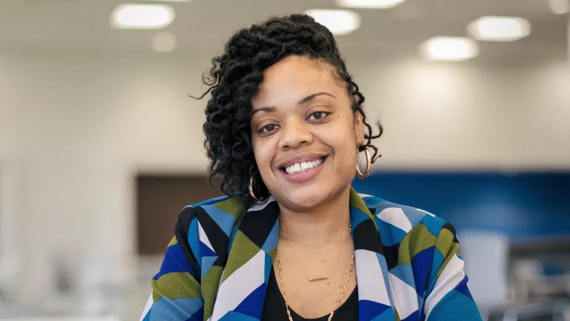 Toya Pollard smiling in an office setting