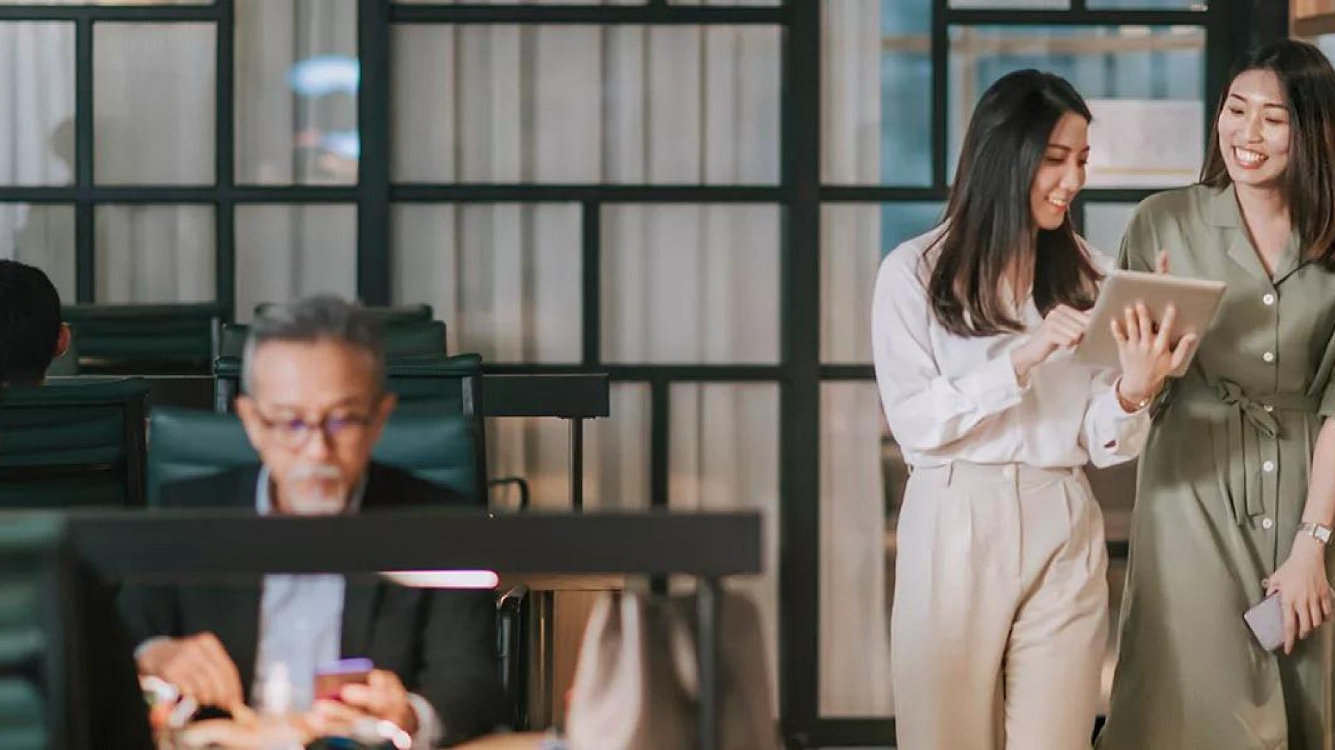 Photo of employees in an office.
