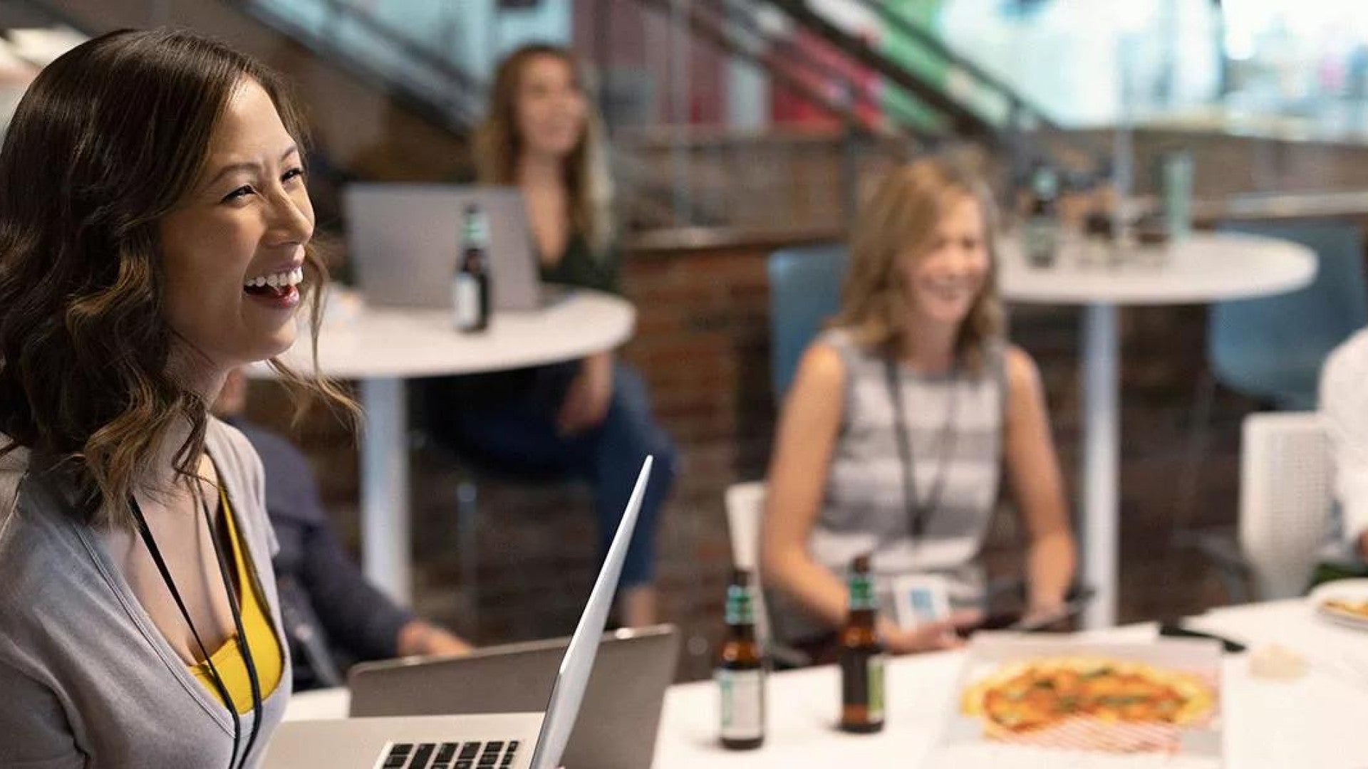 Employees enjoying a lunch meeting