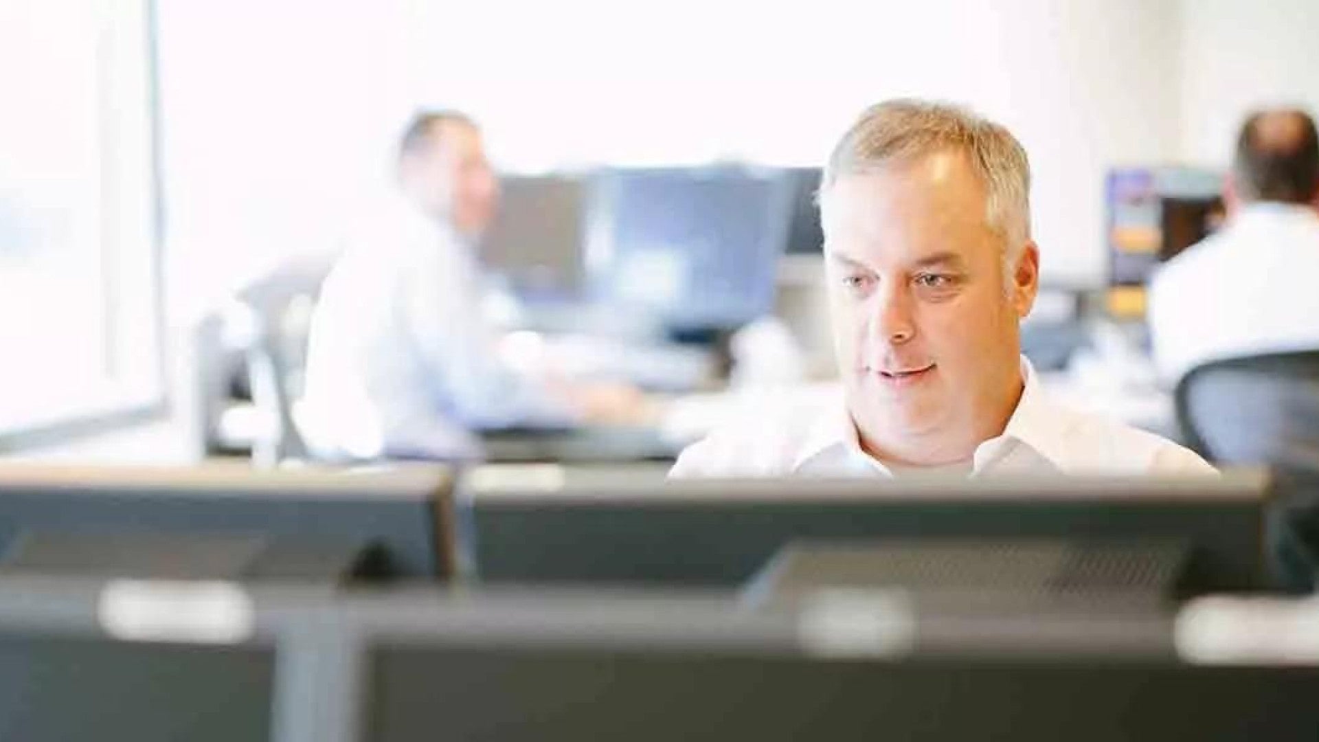 Photo of man in office