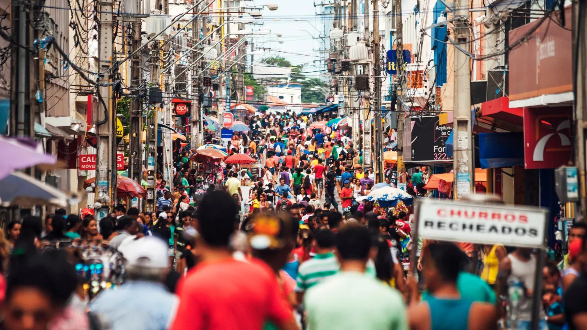 Crowds of people in a busy street