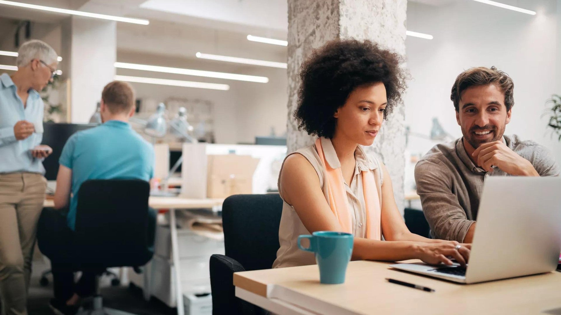 A financial professional helps a client choose from the new investment options available within their retirement plan.