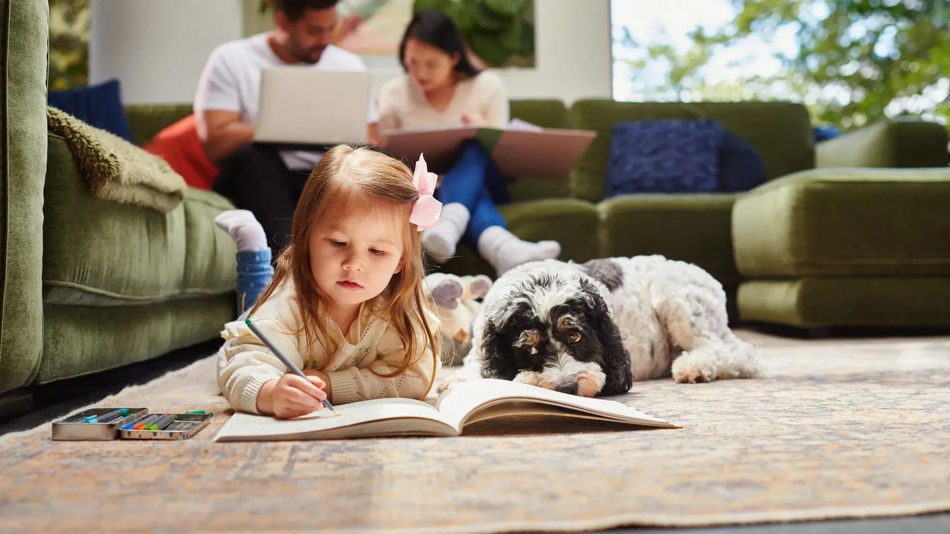 Child and parents playing in home