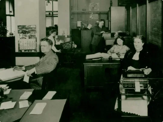Bankers Life employees working in one of the offices in the early 1900s