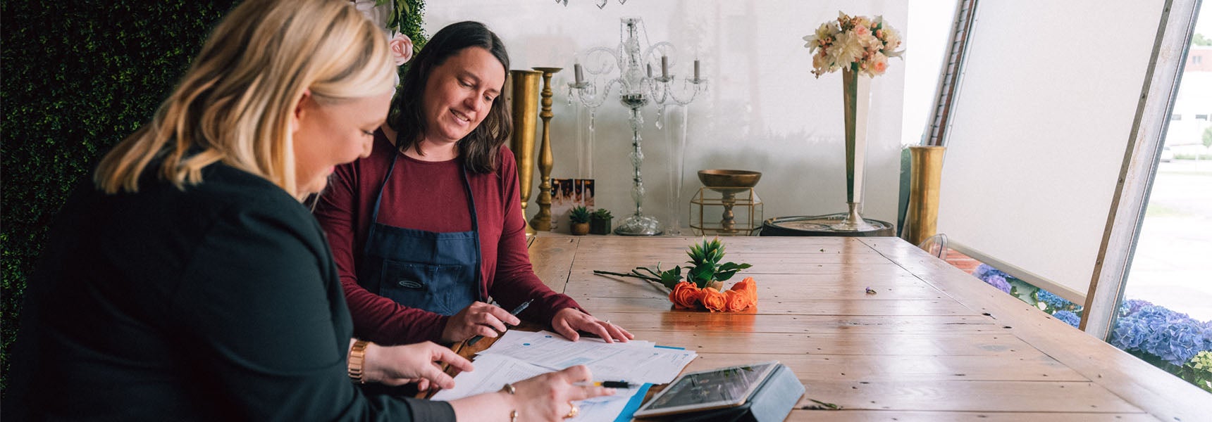 Photo of a woman talking with a financial professional.