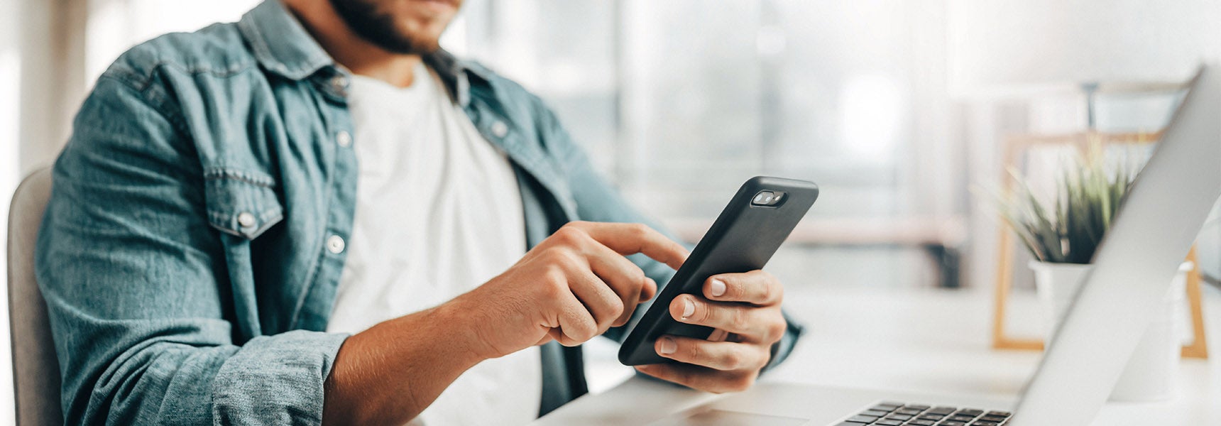 Picture of a man on a cell phone. Photo of a man on a cell phone.