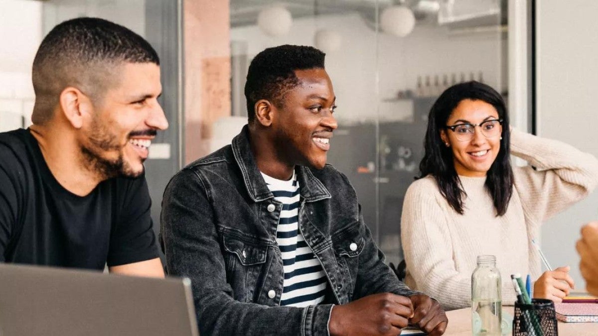 Group of young professionals discussing topics