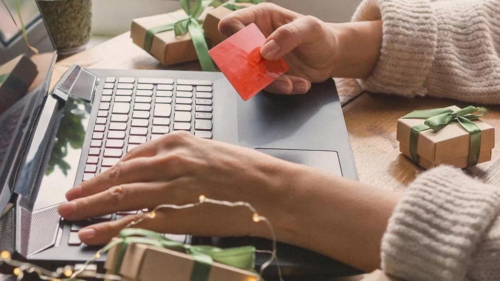 Photo of someone making a purchase online.