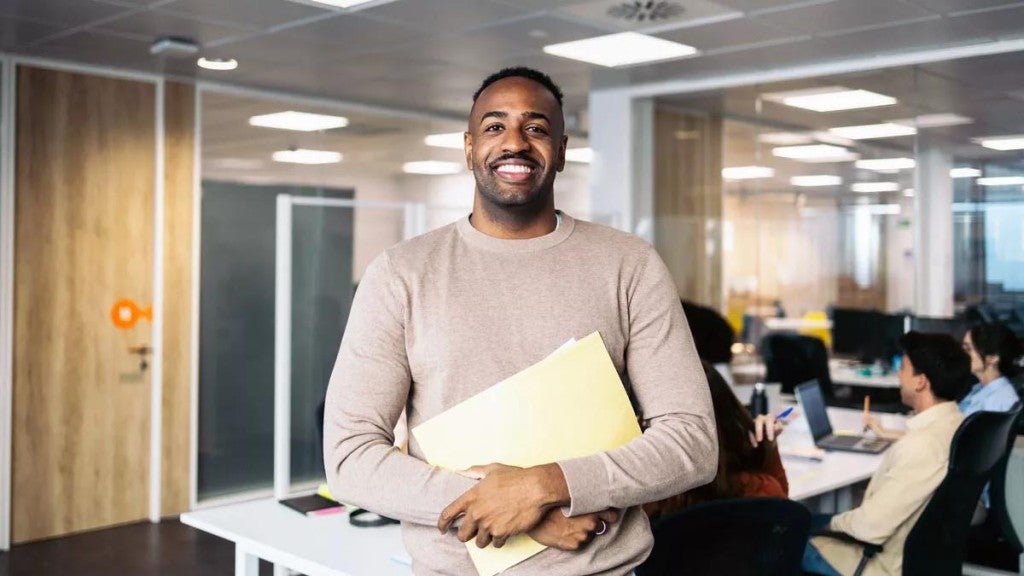 Smiling male in an office setting