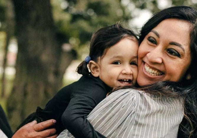 Picture of a mother, child, and grandmother worry-free because they have a will.