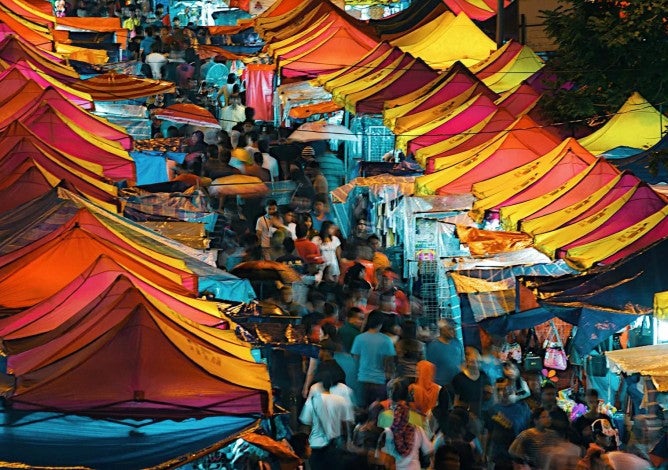 People at night market, Kuala Lumpur, Malaysia.