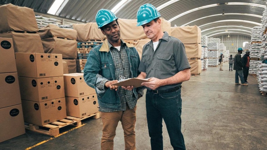 Two men in hard hats at Avery's Dog Treats