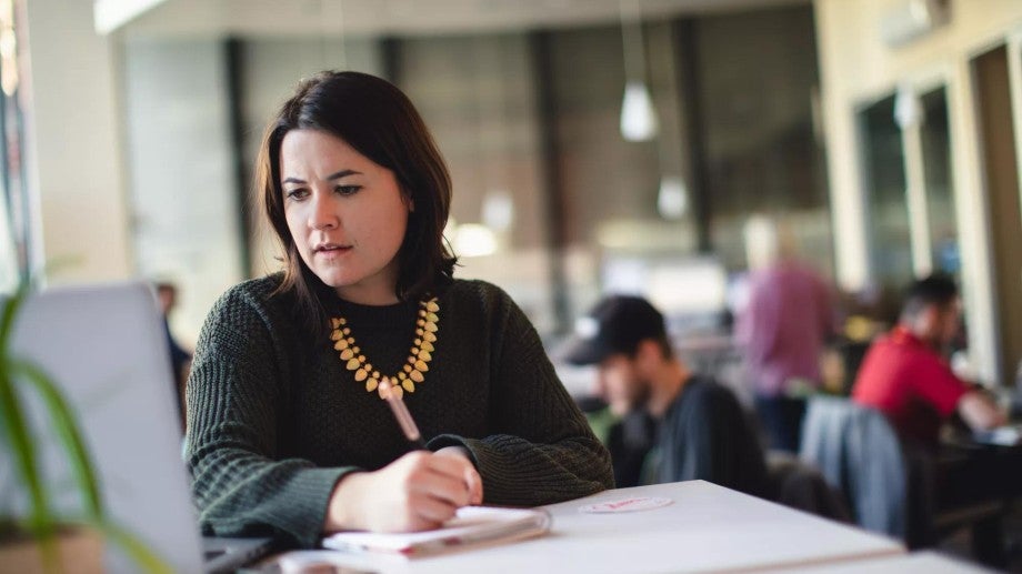 Woman reviewing her defined benefit plan