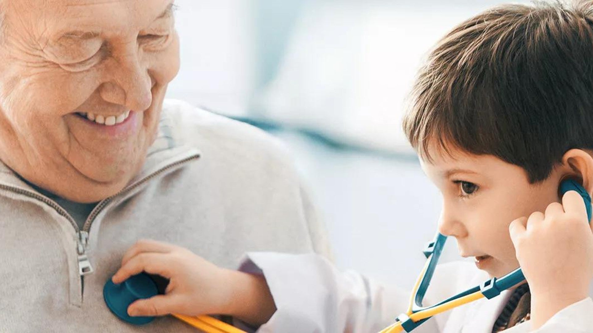 Photo of man enjoying a healthy retirement with grandson.