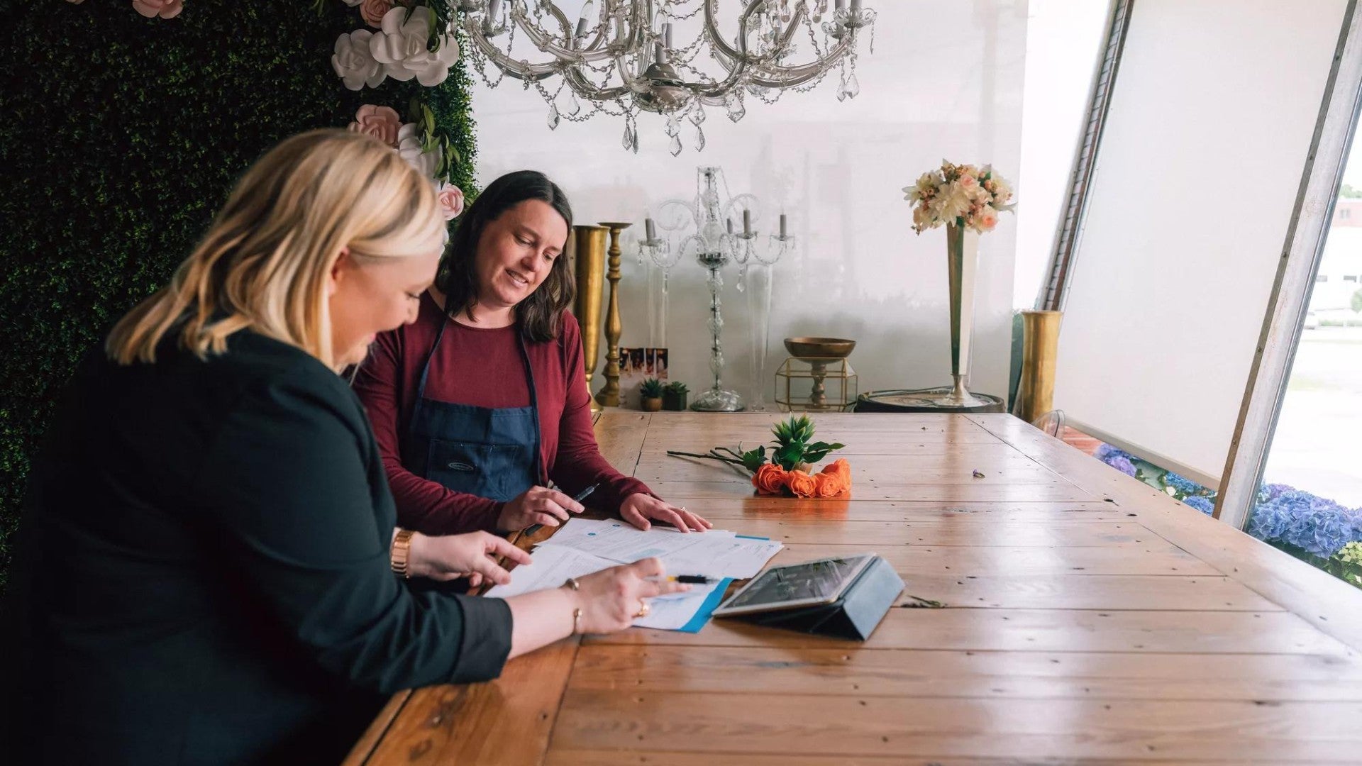 Photo of a woman talking with a financial professional.