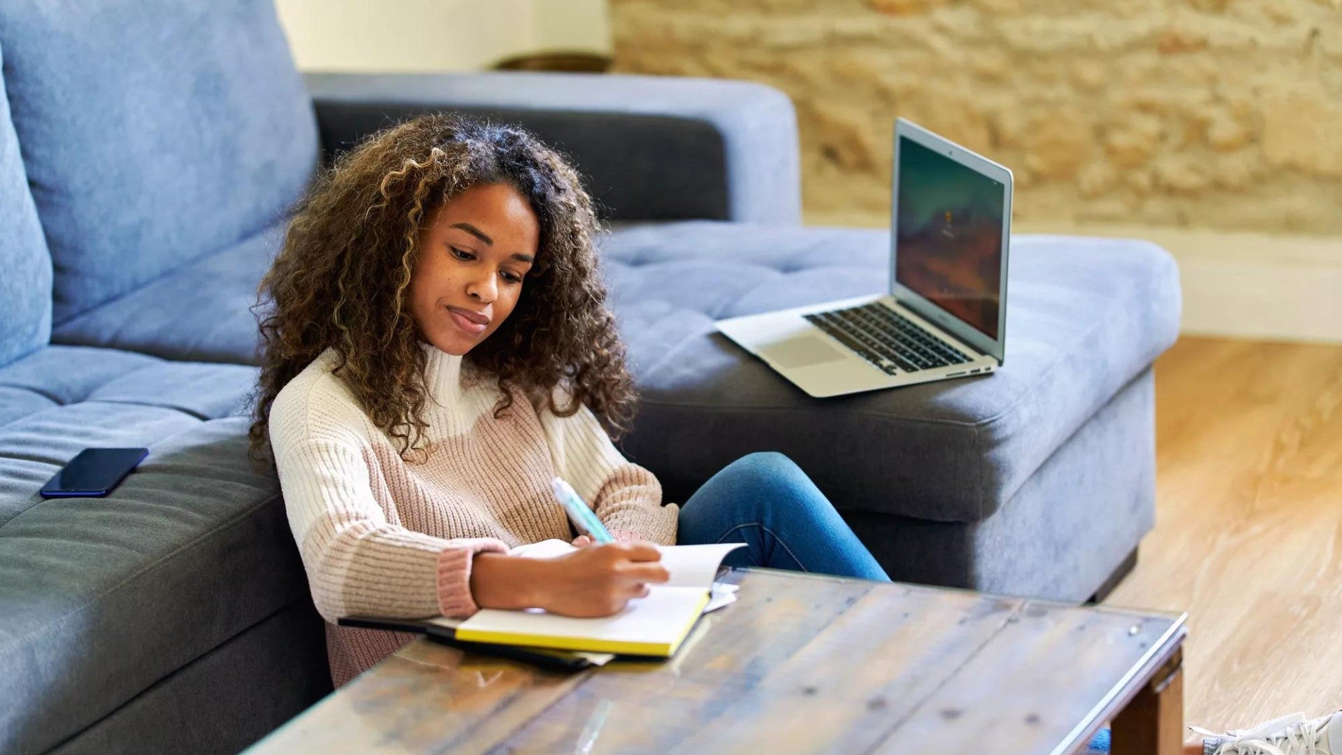 Photo of woman preparing her files for tax season.