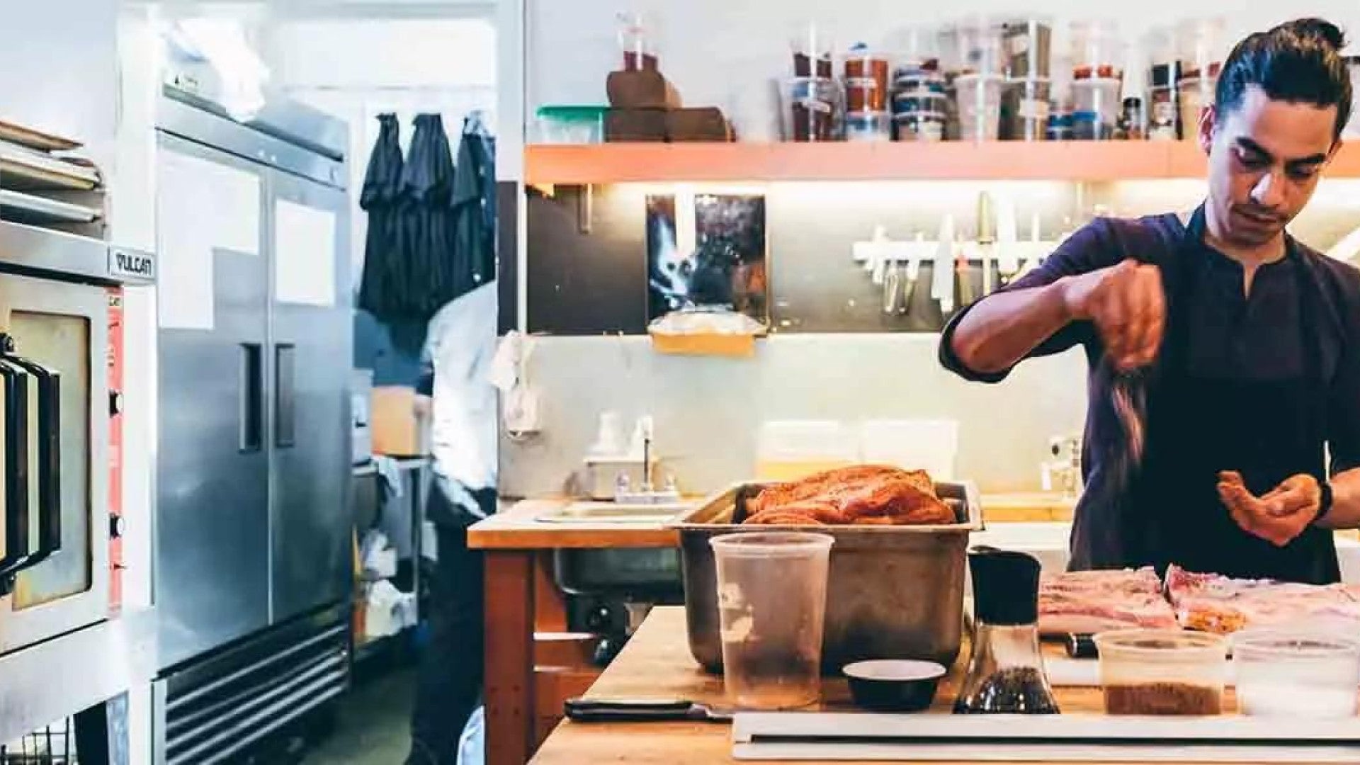 Photo of a chef cooking a meal.