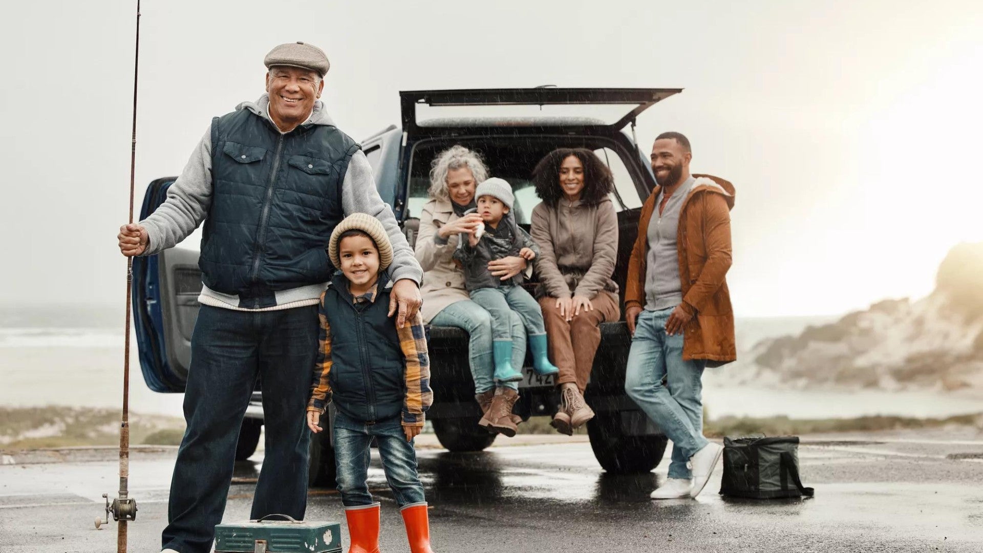 Multigenerational family—including young kids, parents, and grandparents—vacationing together at the coast.